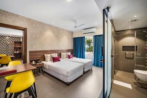 Postel nebo postele na pokoji v ubytování Regency Tuticorin by GRT Hotels