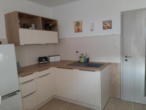 Küche/Küchenzeile in der Unterkunft Ferienwohnung Morgensonne Kurort Rathen