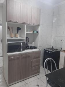 Una cocina o zona de cocina en Apartamento.mutchisma5