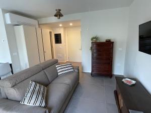 A television and/or entertainment centre at Lucia Holiday Apartments