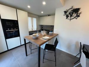 A kitchen or kitchenette at Lucia Holiday Apartments