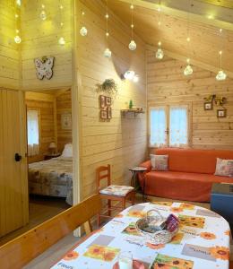 A bed or beds in a room at CHALET ETNA MILO