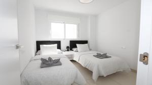 Кровать или кровати в номере REF 9959 Green Apartment La Marina