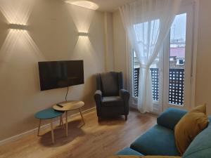 พื้นที่นั่งเล่นของ Apartamentos Picasso