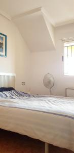 Posteľ alebo postele v izbe v ubytovaní Family Apartment in La Herrada near the Pink Lake