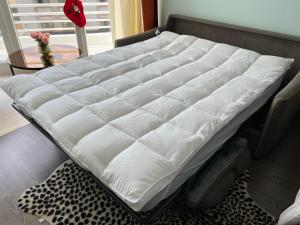 A bed or beds in a room at Pradollano LUXUS Grandes vistas