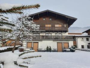 Profelt`s Apartments Uttendorf - Steinbock Lodges v zimě