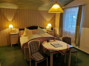 Postel nebo postele na pokoji v ubytování Pension Garni Appartement Ortner