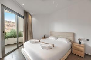 Ένα ή περισσότερα κρεβάτια σε δωμάτιο στο Gazmira 2-3 DELUXE 1B +7 φωτογραφίες