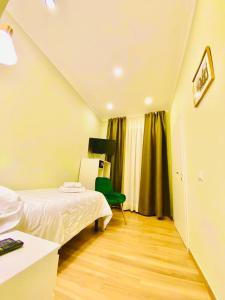 Postel nebo postele na pokoji v ubytování Garibaldi Home
