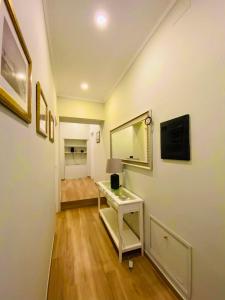 TV a/nebo společenská místnost v ubytování Garibaldi Home + 6 fotografií
