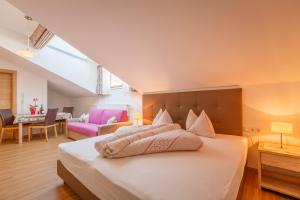 Posteľ alebo postele v izbe v ubytovaní Residence Silvia