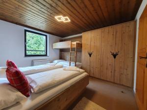 Ένα ή περισσότερα κρεβάτια σε δωμάτιο στο Apartment Metzger - Steinbock Lodges