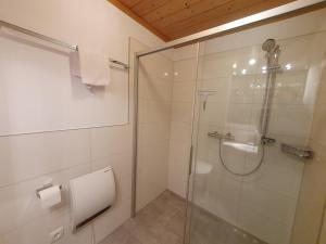 Ένα μπάνιο στο Apartment Metzger - Steinbock Lodges