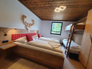 Ένα ή περισσότερα κρεβάτια σε δωμάτιο στο Apartment Metzger - Steinbock Lodges