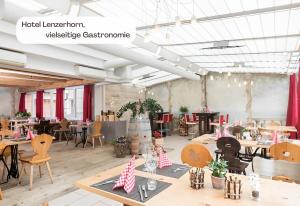 Veitingastaður eða matsölustaður á Hotel Lenzerhorn - Alpine Stay, Spa & Savour