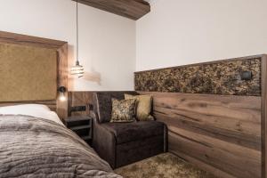 Letto o letti in una camera di Hotel Edenlehen