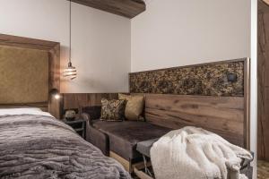 Letto o letti in una camera di Hotel Edenlehen