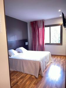 Katil atau katil-katil dalam bilik di Hotel Bruc