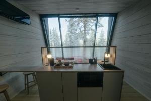 Kuchyň nebo kuchyňský kout v ubytování Salla Wilderness Lodges