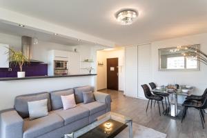 Kuchyňa alebo kuchynka v ubytovaní Le Lounge - 2 chambres avec parking + 7 fotografií