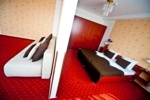 Posteľ alebo postele v izbe v ubytovaní Canada Hotel Budapest