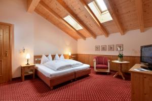 Postel nebo postele na pokoji v ubytování Hotel Edenlehen + 37 fotografií