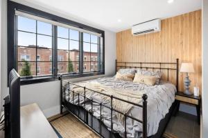 a bedroom with a bed and a window at Brooklyn love loft - Private hidden gem in Brooklyn in Brooklyn