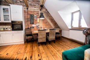Kuchyň nebo kuchyňský kout v ubytování AP Apartment's
