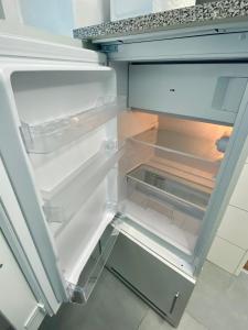 Kuchyň nebo kuchyňský kout v ubytování Einzimmer-Apartment 25 m2 Gartenzinken im Zentrum von Bad Ischl