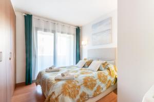 Posteľ alebo postele v izbe v ubytovaní Sant Sebastià Moderno apartamento a 100 metros de la playa