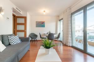 Posedenie v ubytovaní Sant Sebastià Moderno apartamento a 100 metros de la playa