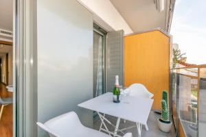 Balkón alebo terasa v ubytovaní Sant Sebastià Moderno apartamento a 100 metros de la playa