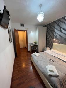 Krevet ili kreveti u jedinici u okviru objekta Hotel Como