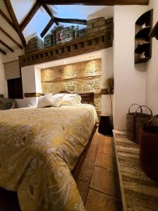 Un ou plusieurs lits dans un hébergement de l'établissement BETANIA Casa Hotel