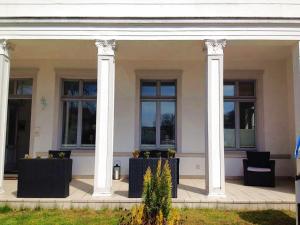 Ein Sitzbereich in der Unterkunft Villa Schering App. EG links
