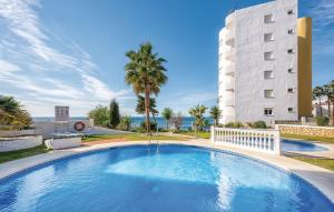 a large swimming pool in front of a building at CT 190 - Pearl of Algaida I in Sitio de Calahonda