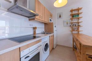 A kitchen or kitchenette at 797 HR - Pueblo Evita- Andalusian apartment with terrace.