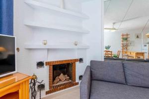 A television and/or entertainment centre at 797 HR - Pueblo Evita- Andalusian apartment with terrace.