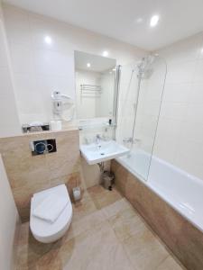 Kúpeľňa v ubytovaní Hotel Galanta