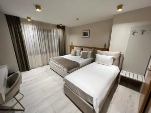 Letto o letti in una camera di Albergo Aida