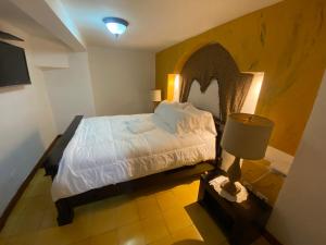 Cama ou camas em um quarto em Oasis Hotel mais 51 fotos