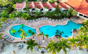 an aerial view of a resort with two pools at Fantasy Island Beach Resort and Marina - All Inclusive in First Bight