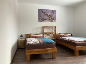 Postel nebo postele na pokoji v ubytování Ferienwohnung-Kroeger-I
