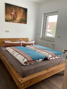 Postel nebo postele na pokoji v ubytování Ferienwohnung-Kroeger-I