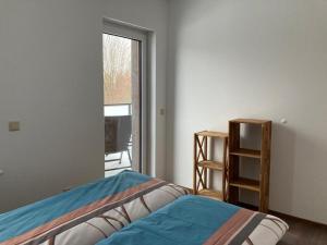 Postel nebo postele na pokoji v ubytování Ferienwohnung-Kroeger-I