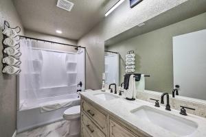 a bathroom with a sink and a toilet and a tub at Fayetteville Vacation Rental - 2 Mi to Dtwn! in Fayetteville +22 photos