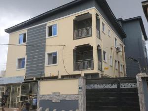 a building with a fence in front of it at DINERO DIAMOND - ONE BED APARTMENT in Lagos