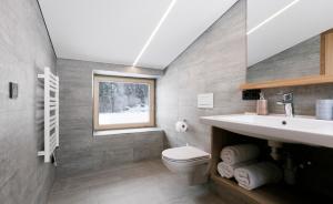Koupelna v ubytování Ferienhaus Schihütte Mellau