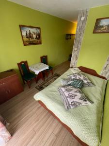 Posteľ alebo postele v izbe v ubytovaní Pokoje Gościnne U Babci